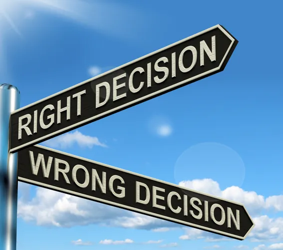 A sign with the words right decision & wrong decision on it